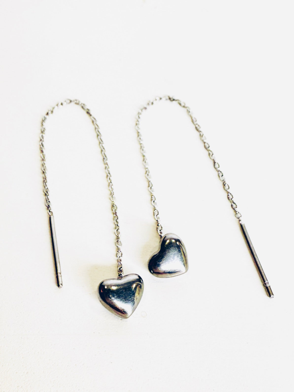 Orecchini Saliscendi cuori silver