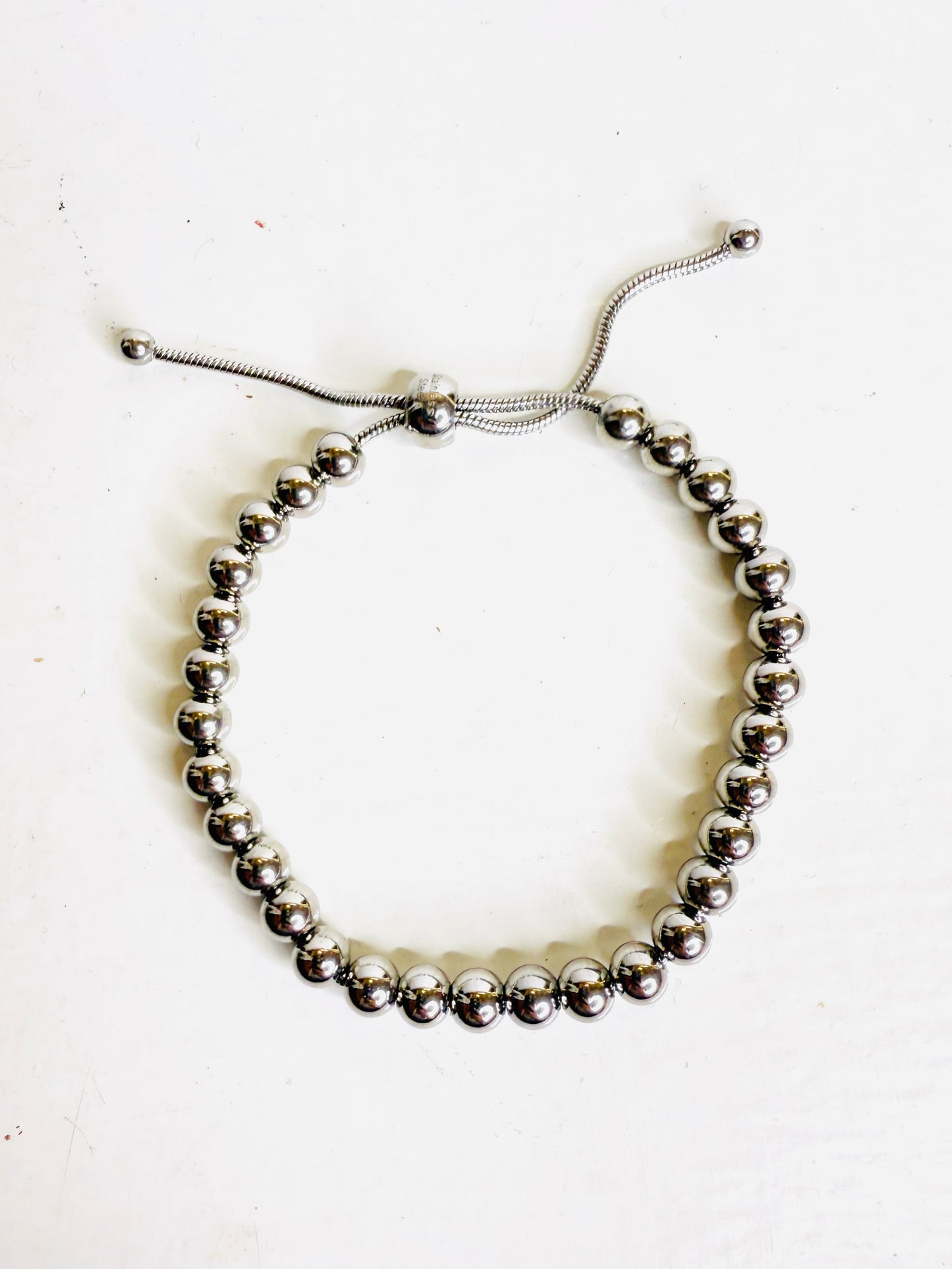 Bracciale sfere saliscendi