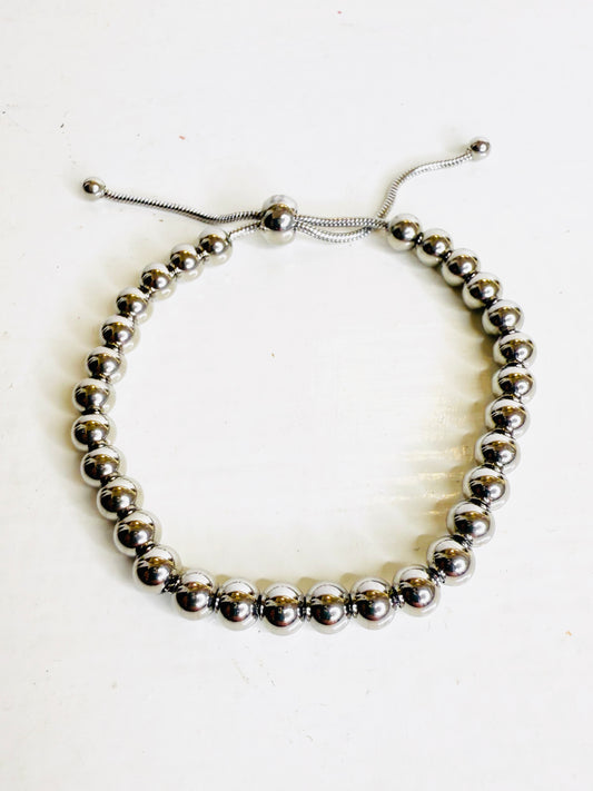 Bracciale sfere saliscendi