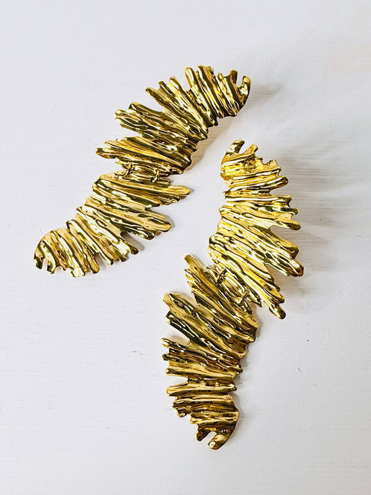 Orecchini pendenti materici