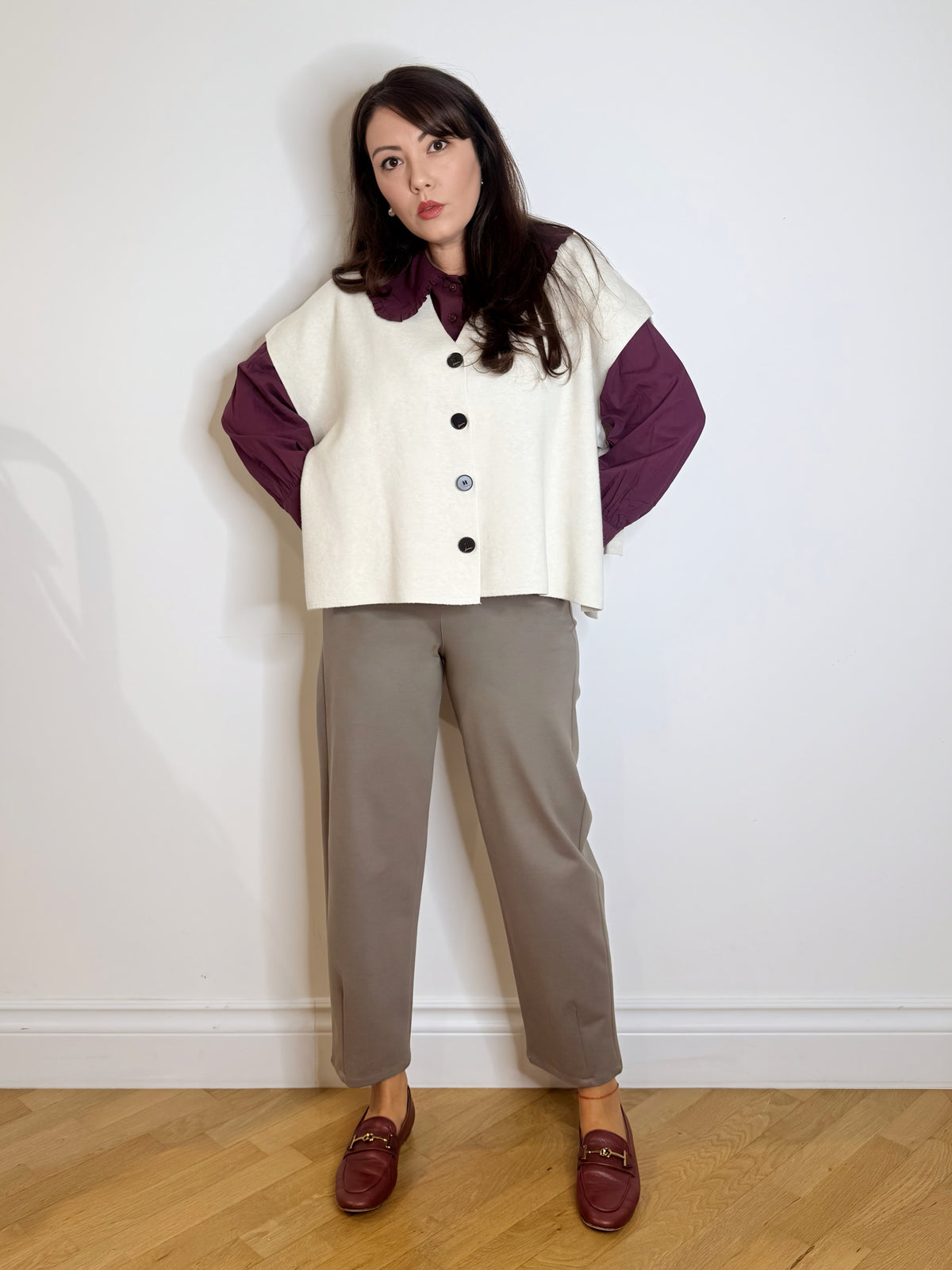 Gilet in maglia con fiocchi
