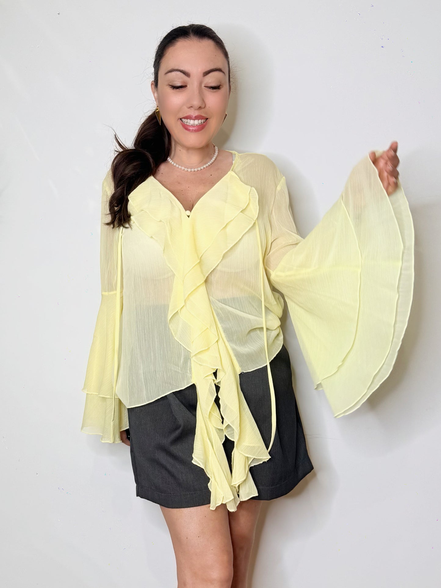 Blusa in georgette con volant